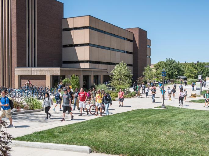 Students walking past Helmke Library